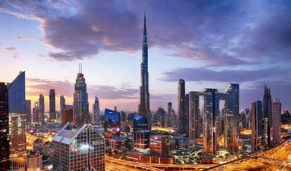 Downtown Dubai skyline by Emaar at dusk